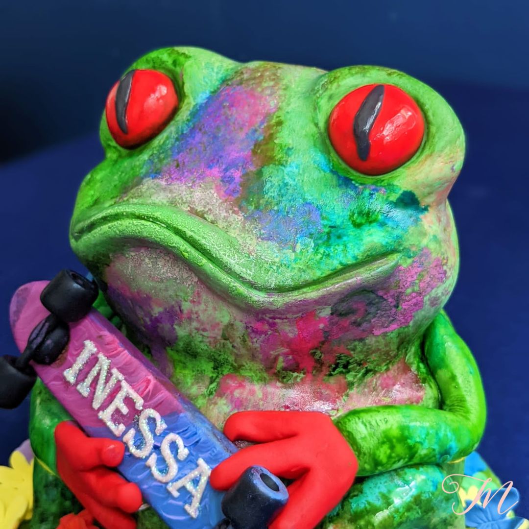 Modern frog cake with skateboard