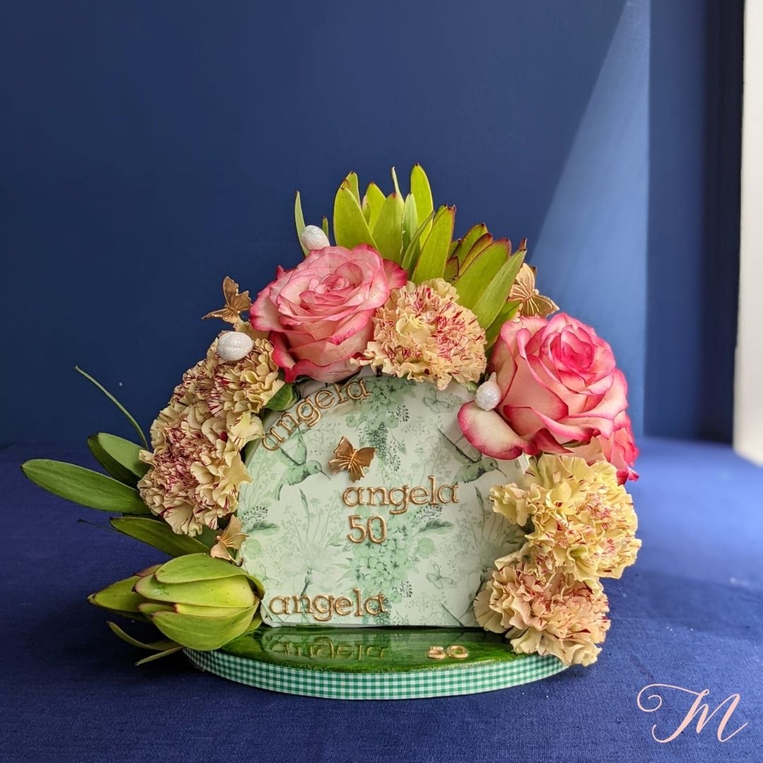 a Floral cake for a 50th birthday