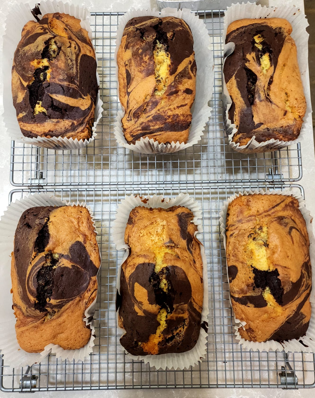 Loaf cakes on a cooling sheet