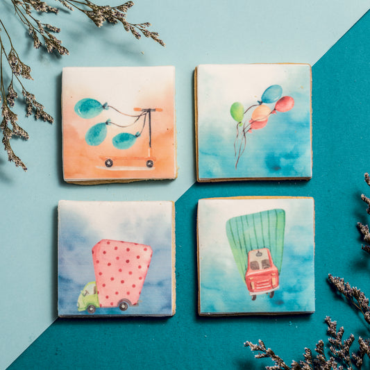 Biscuits with fun trucks and scooters with watercolour effects